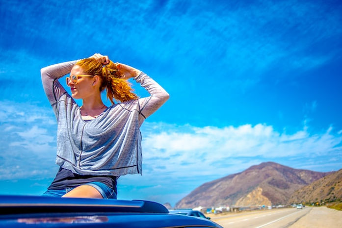 Woman out of a sunroof